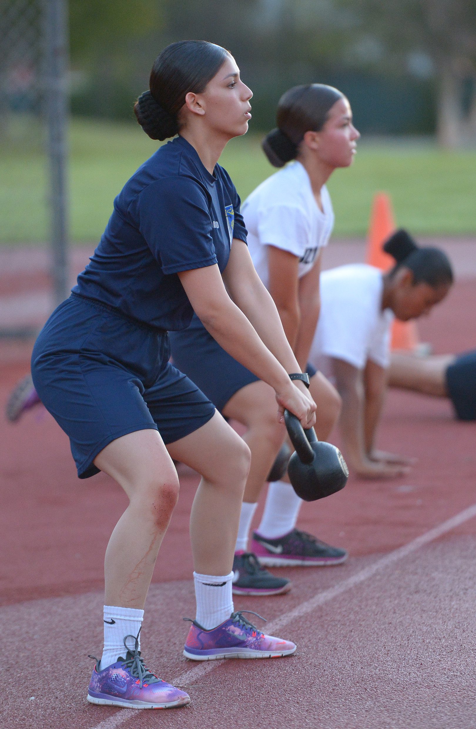 Students Lifting Dumbbells’ in Their Training