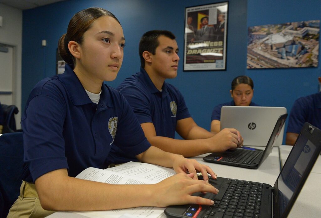 Student’s Attending a Class with Their Laptops