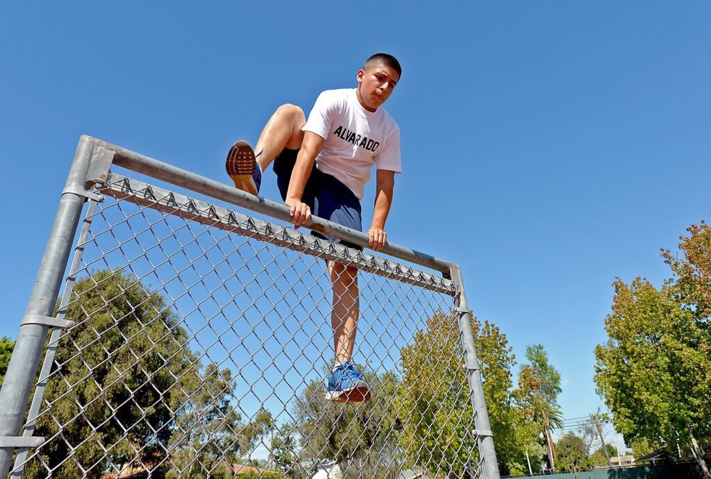 A Man Jumping on the Obstacle